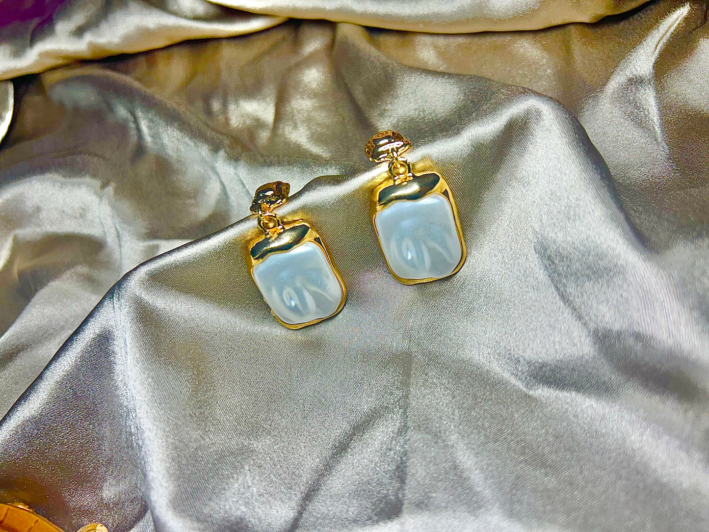 Glossy Pearl White Gold-Tone Drop Earrings – Bold & Elegant