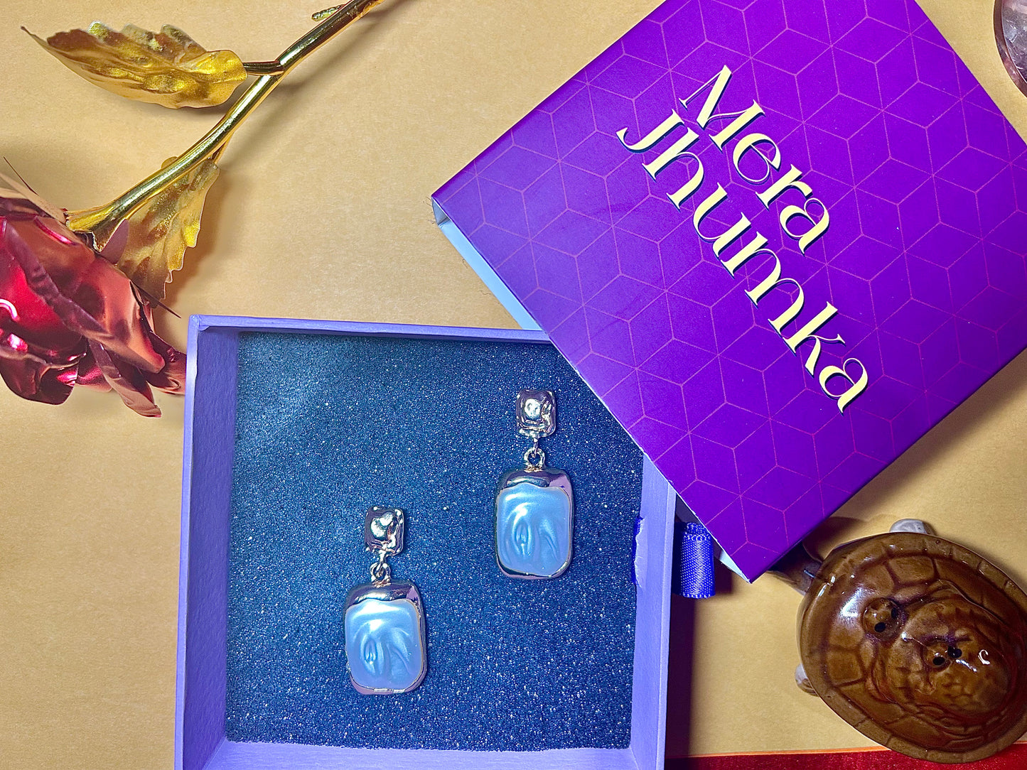 Glossy Pearl White Gold-Tone Drop Earrings – Bold & Elegant