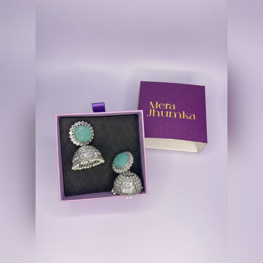 Mint Green Stone Silver Jhumka Earrings | Trendy Ethnic Statement Jewelry by Mera Jhumka